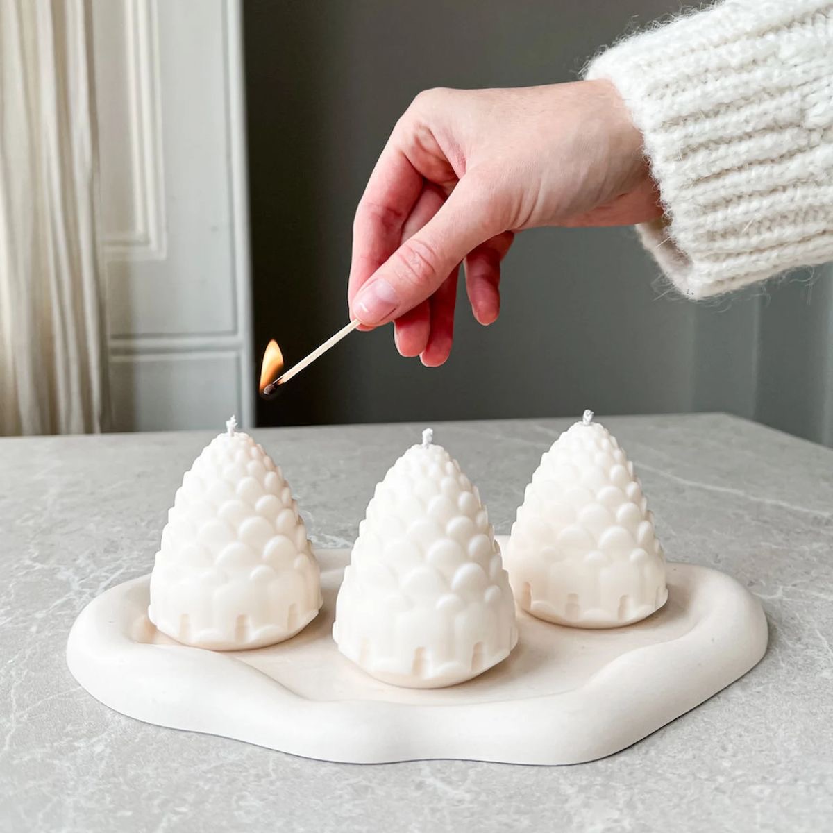 Winter pine cone candle