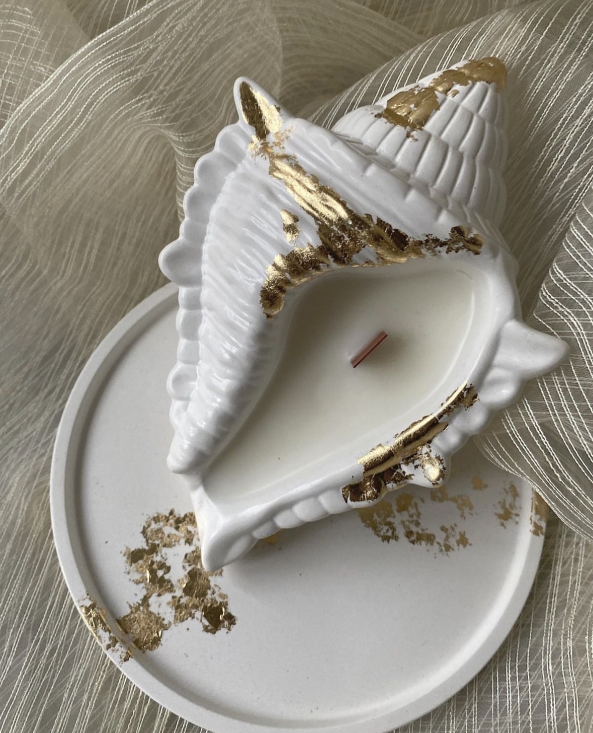 Stone shell candle 